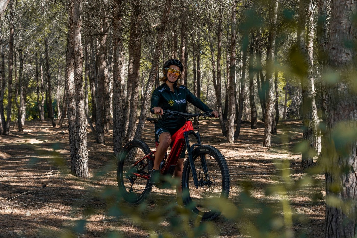 Trail rider on an e-mountain bike in a forest